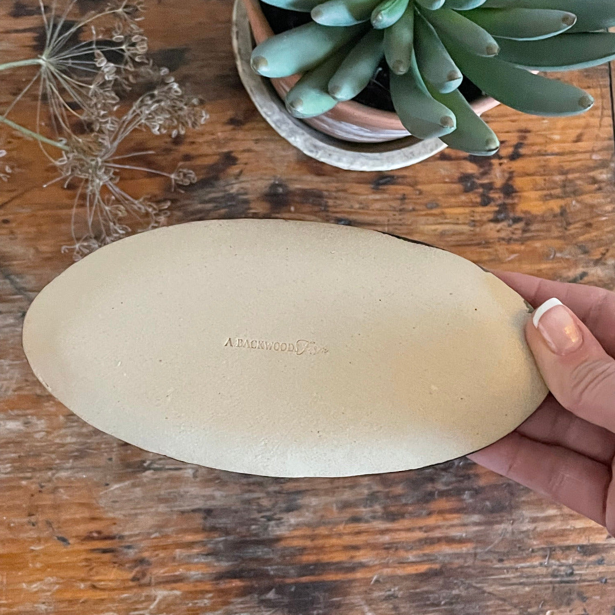Handmade Oval Trinket Dish In Black Matte Finish and Raised Design